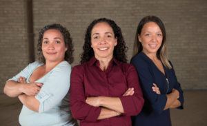 Picture of 3 Anchem employees with their arms crossed.
