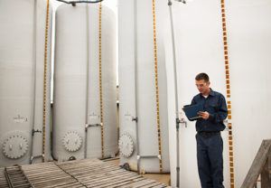 Picture of Anchem Team member working with his clipboard